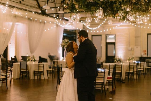 A couple sharing a private last dance at the end of their wedding reception — Photo by Brett Seay Photography